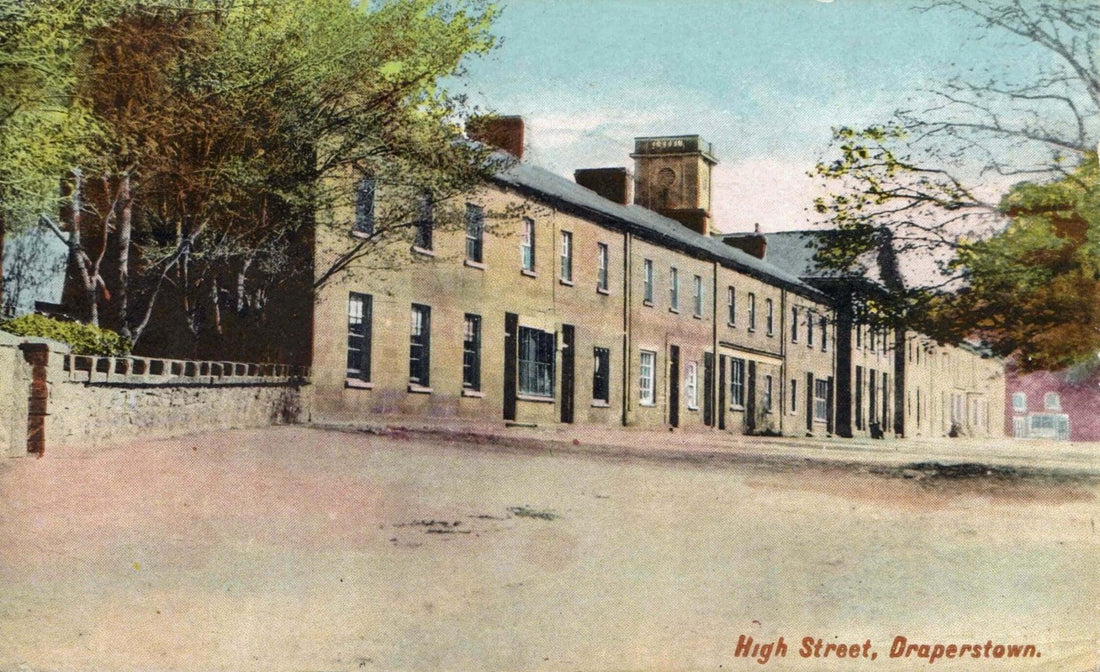Historic view of High Street, Draperstown showcasing traditional architecture and tree-lined streets.