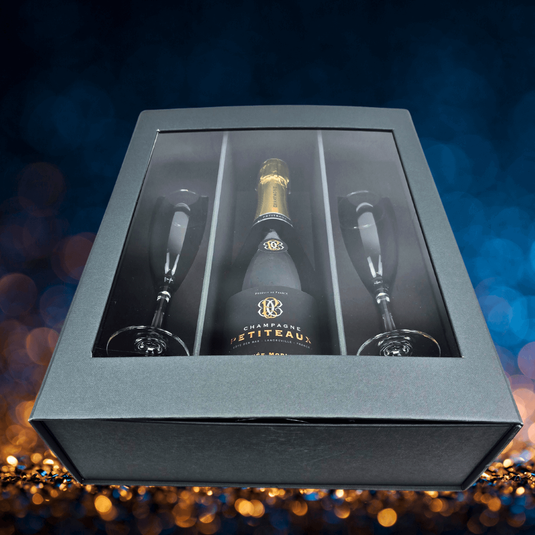 Champagne Petiteaux Extra Brut, with two classic flute. Champagne glasses Nrthern Ireland