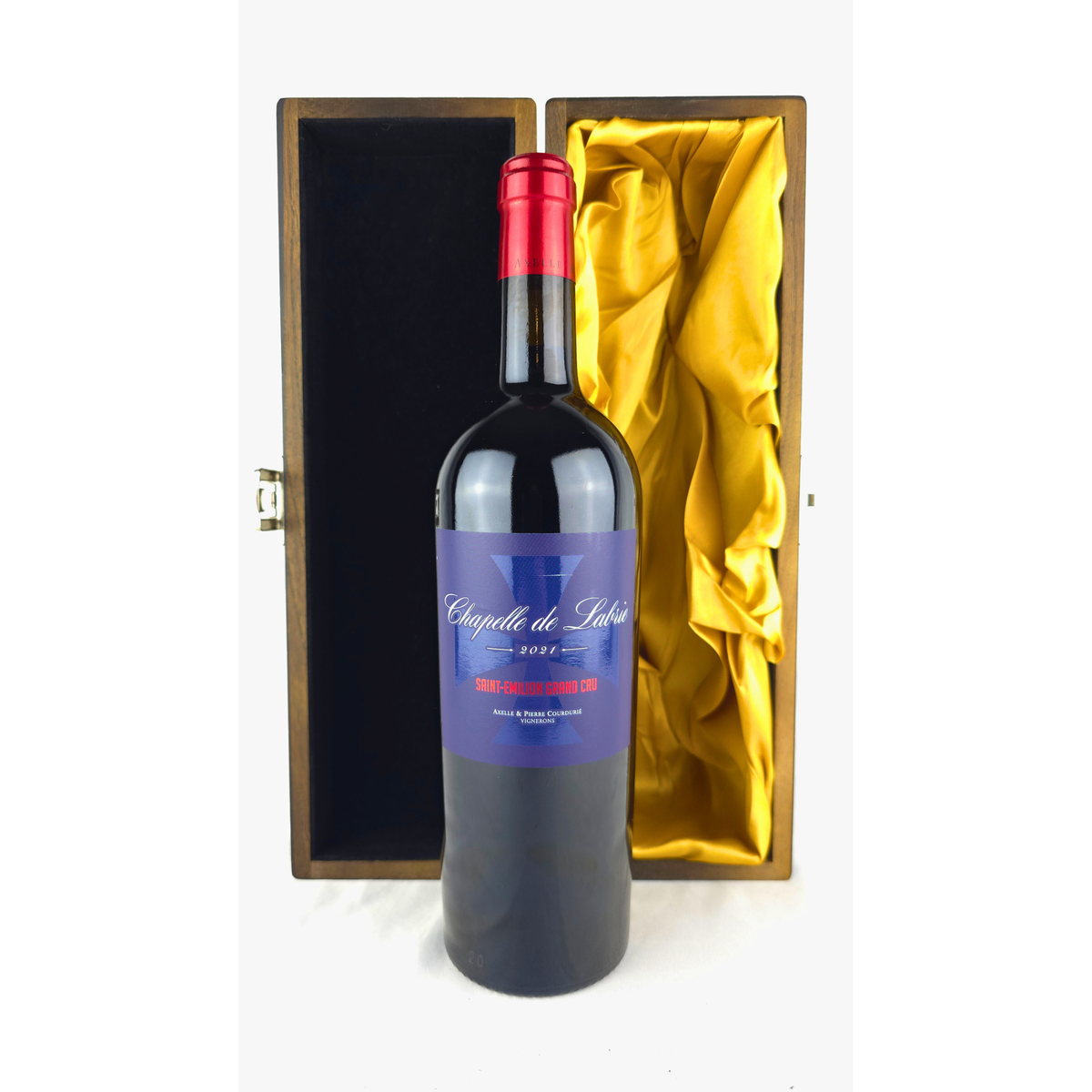 Chapelle de Labrie 2021 Grand Cru bottle standing in front of its open elm wood gift box with gold lining