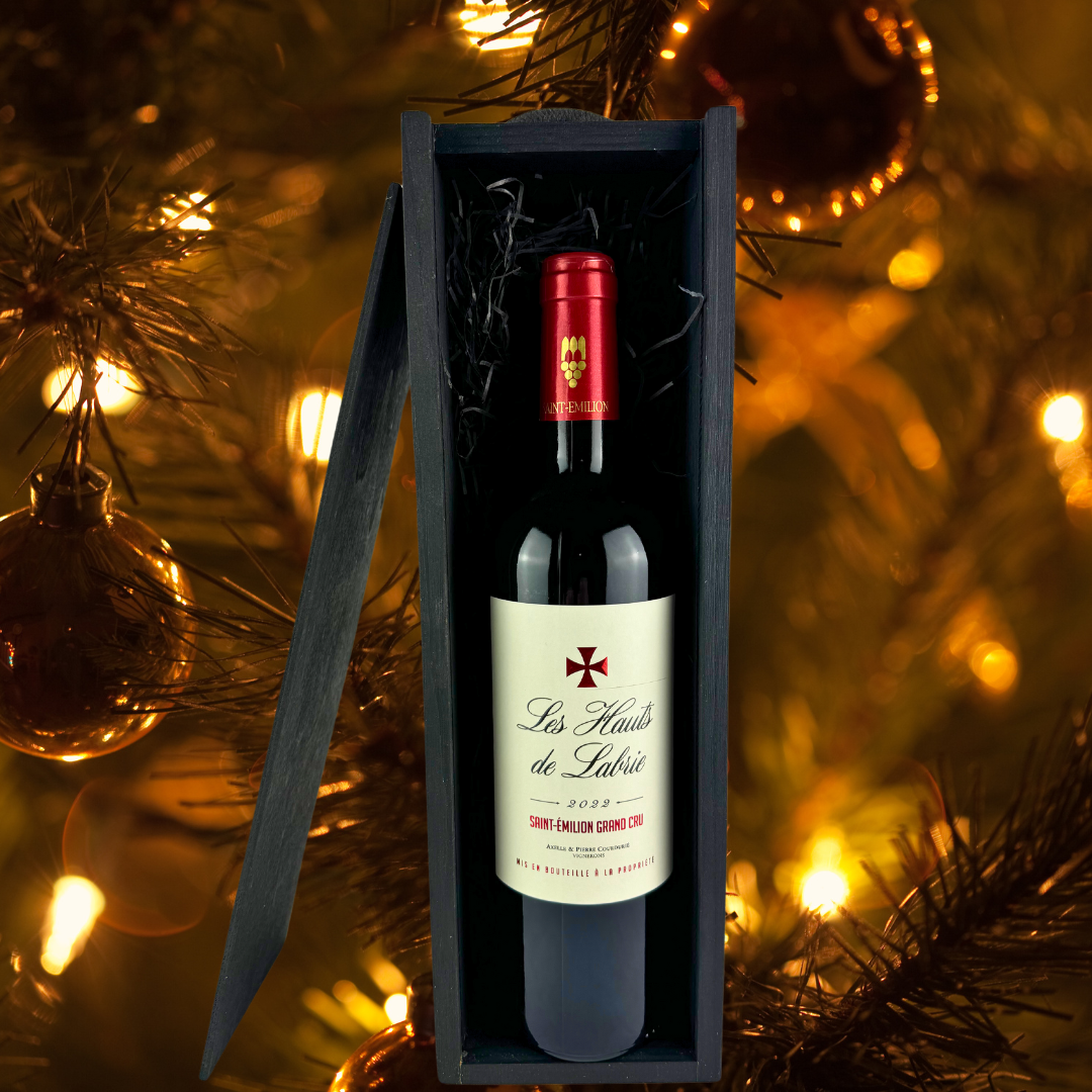 "Discover AOC Saint-Emilion Grand Cru, an elegant blend of 85% Merlot and 15% Cabernet Franc. Rich with red berries, spices, and chocolate notes, perfect for immediate enjoyment or aging."